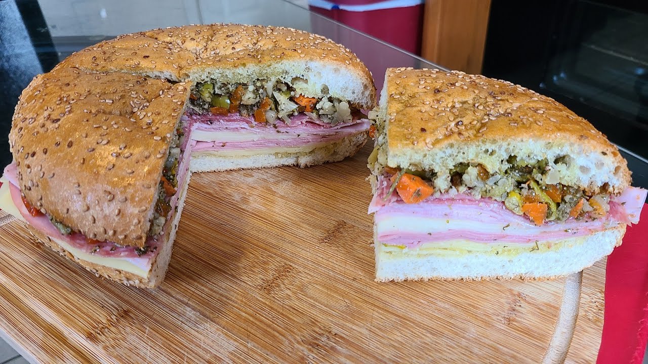 Central Grocery signature dishes Original Muffuletta
Olive Salad
Imported Cheeses